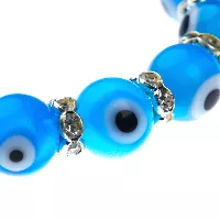 Pulsera de ojos turcos en color azul translúcido